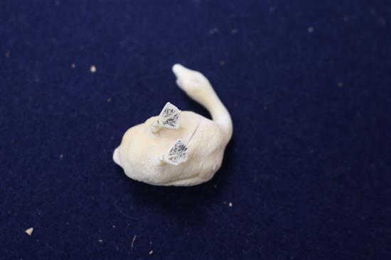 A carved ivory animal group